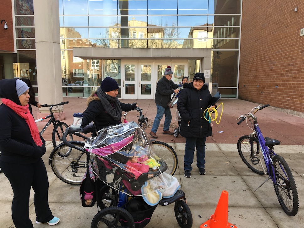 Students Receiving Bicycles from Bill